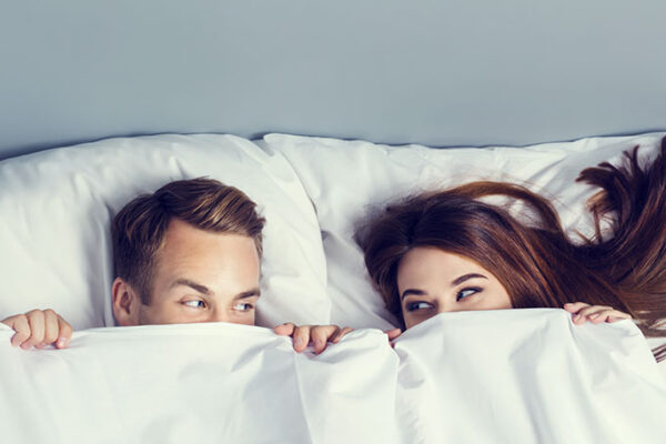 Every Couple’s Secret to Better Sleep: Sharing the Covers